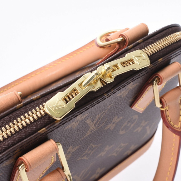 Louis Vuitton Monogram Alma Brown Canvas Handbag - Picture 8 of 9